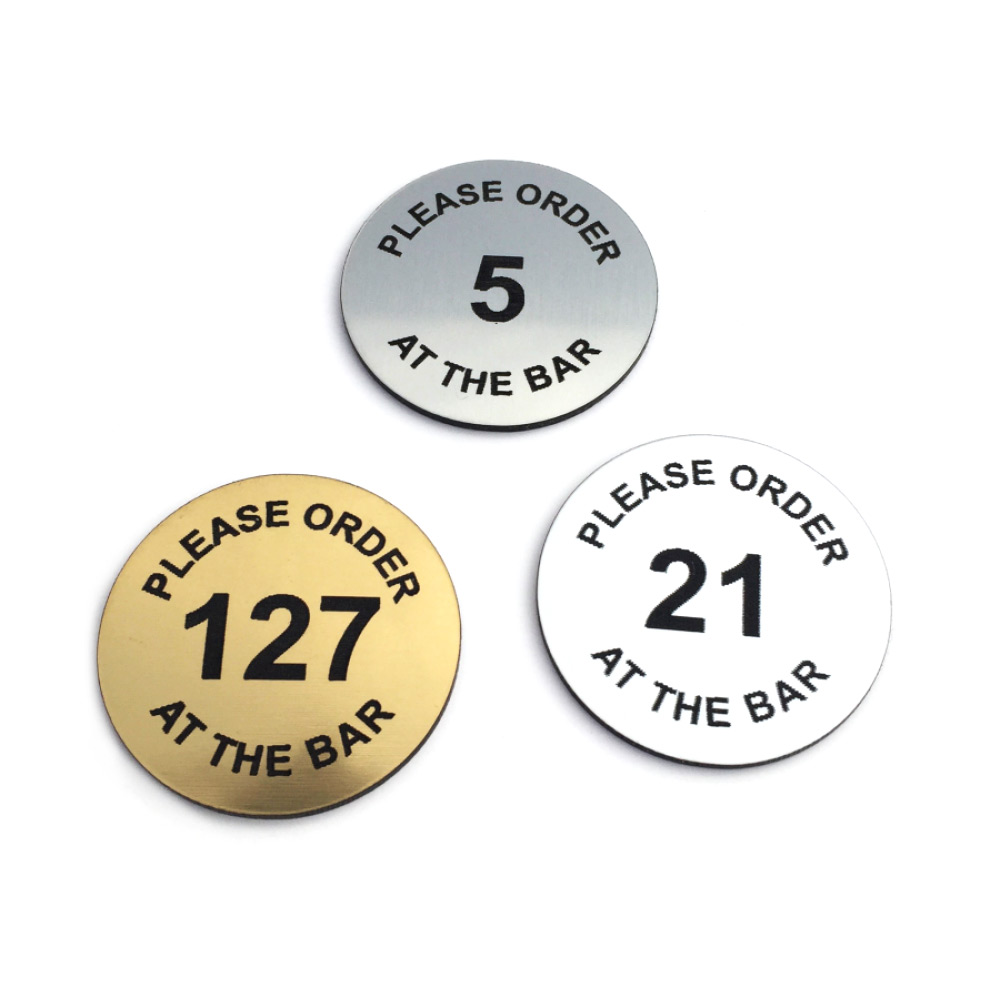 Pack of 10 Brass Effect Table Information Discs Engraved with Please Place Your Order at The BAR and Numbers 51-60 Supplied with Self-Adhesive Backing 