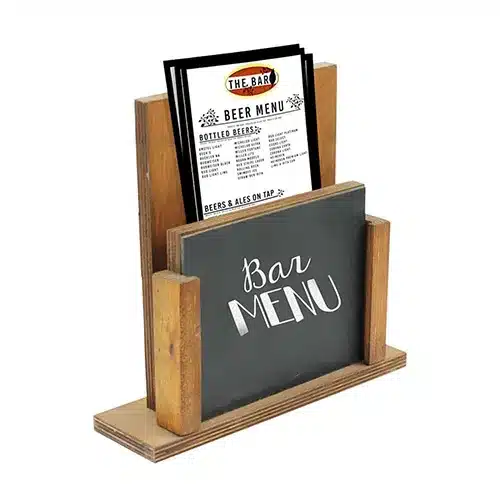 Menu covers sitting on a chalkboard