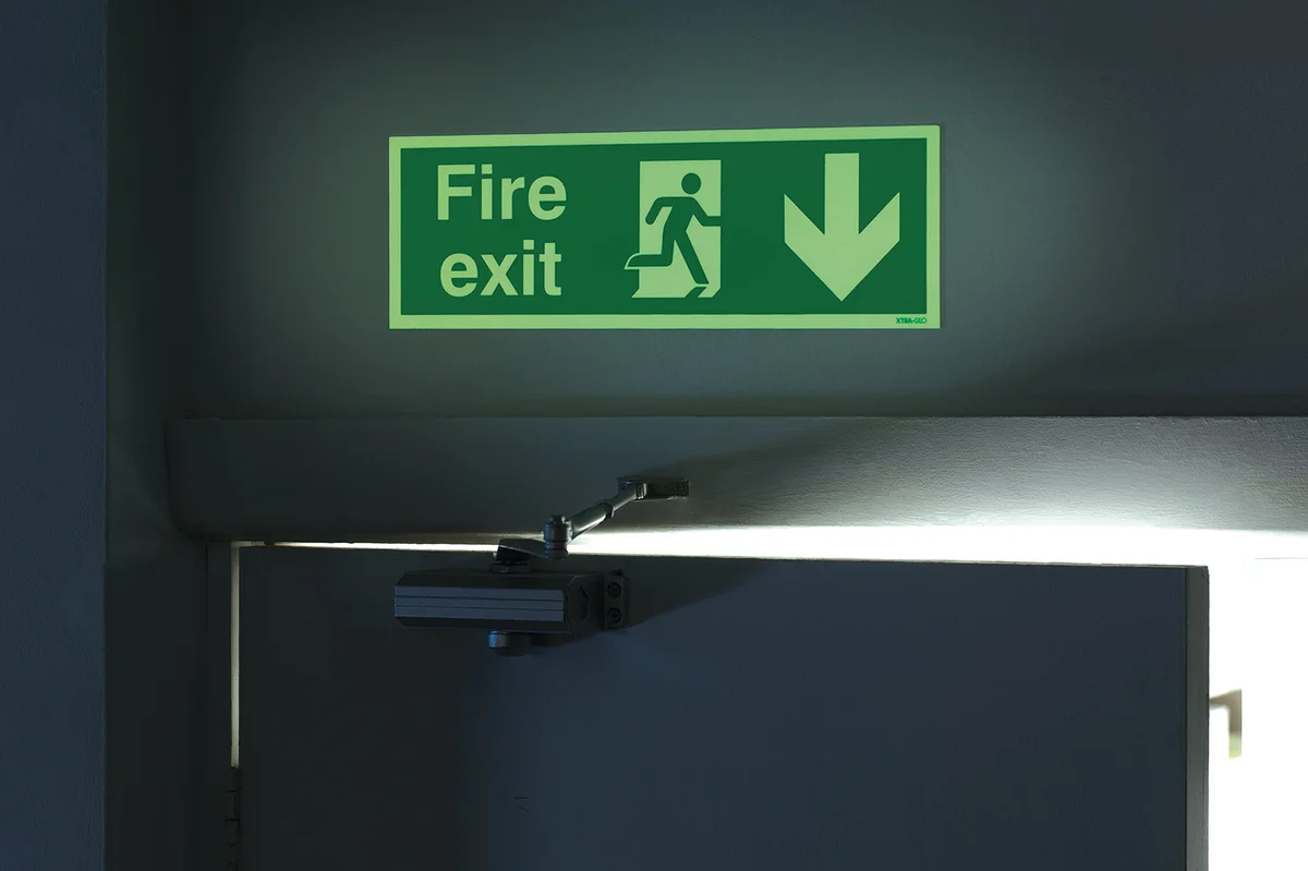 Safety Sign Niteglo Fire Exit Running Man Arrow Down Self-Adhesive 150x450mm NG28A/S - Image 2