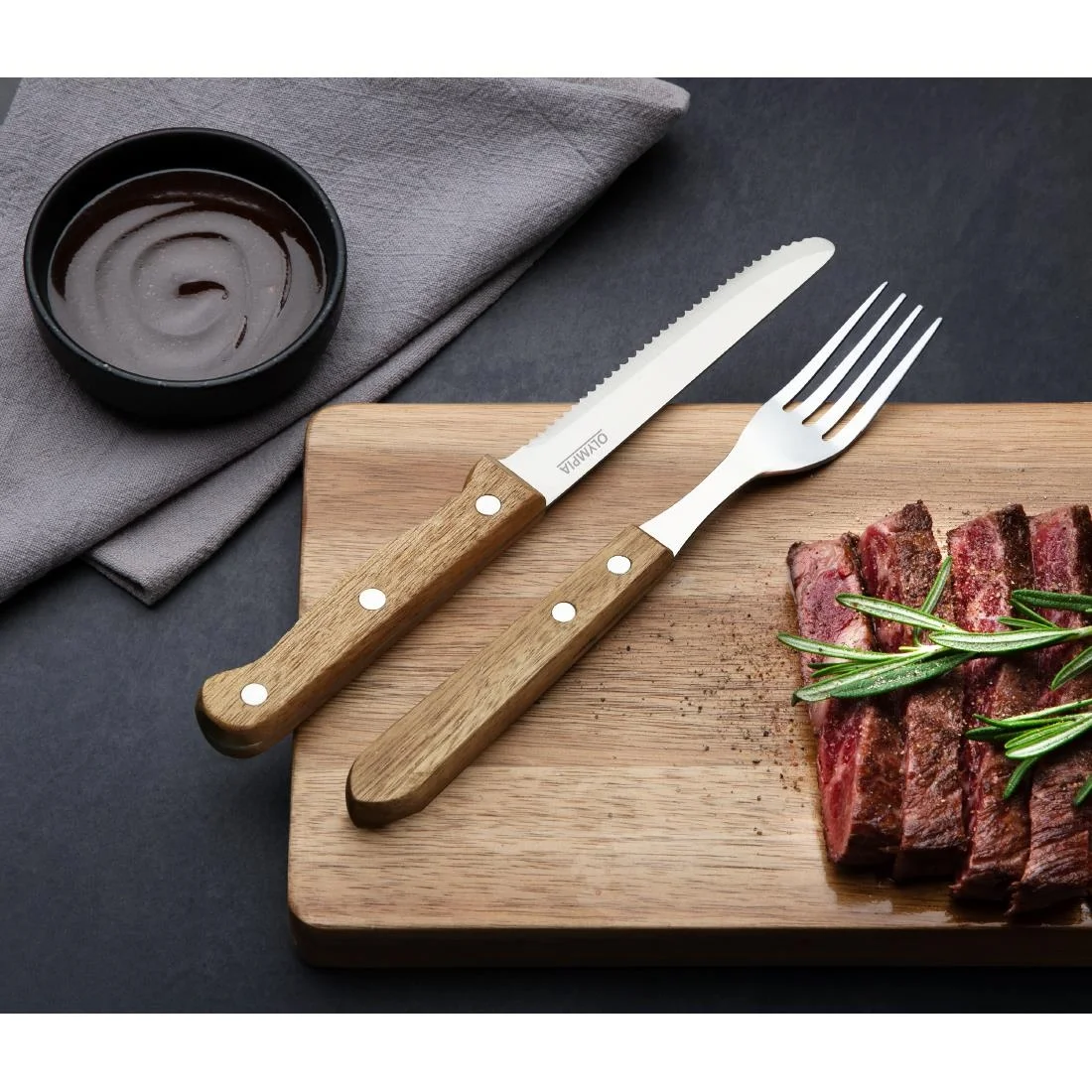 Olympia Rounded Steak Knives with Merbau Wood Handles (12 Pack) - Image 5